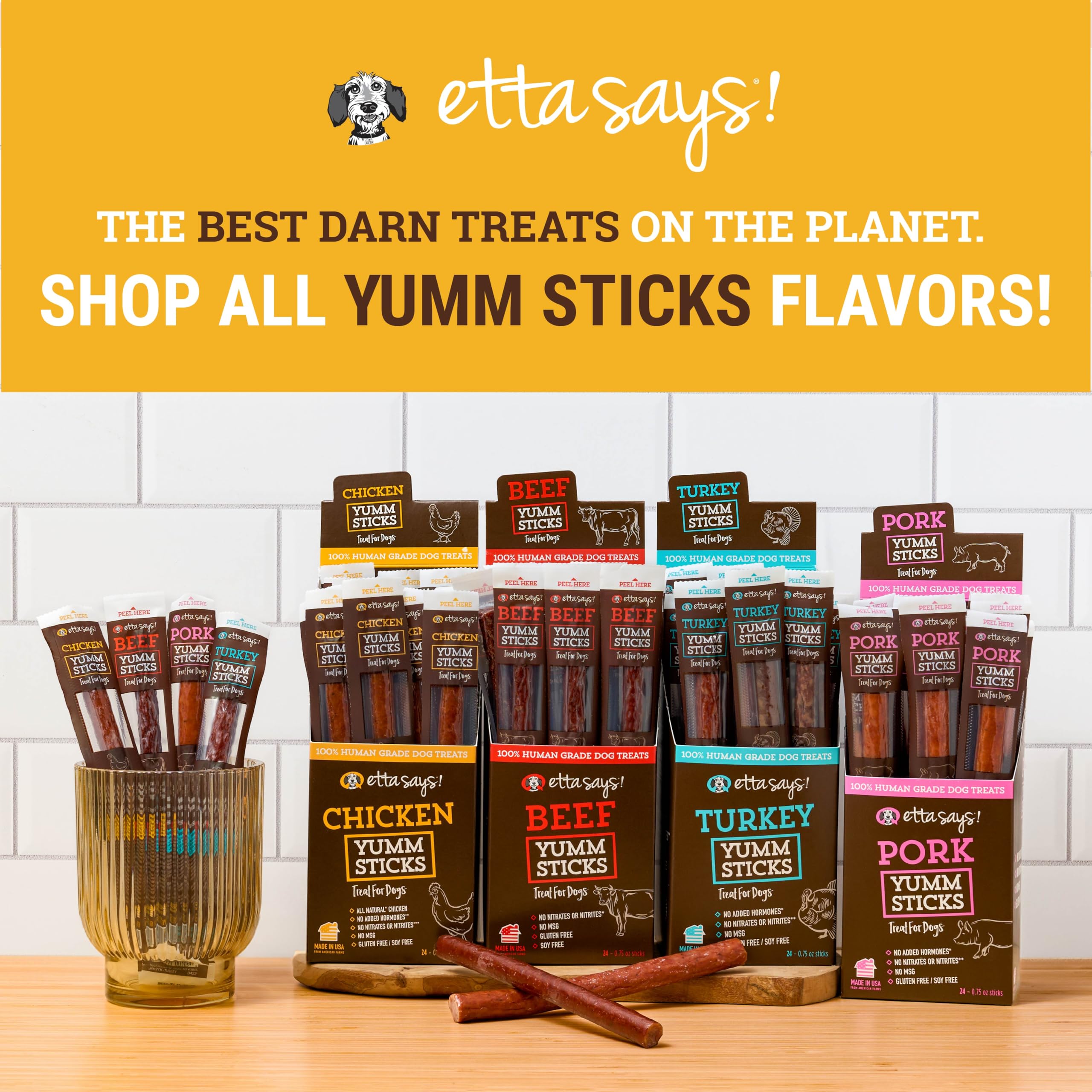 etta says! Yumm Sticks dog enjoying the treat during playtime display.