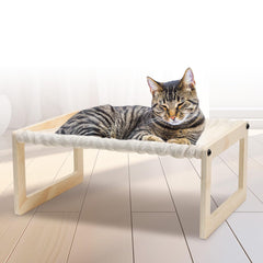 EUIJOIP cat bed with wooden frame provides sturdy elevation for comfy naps.
