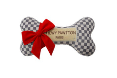 Everything Chic ChewyPawtton checkered bone toy for stylish squeak and play sessions