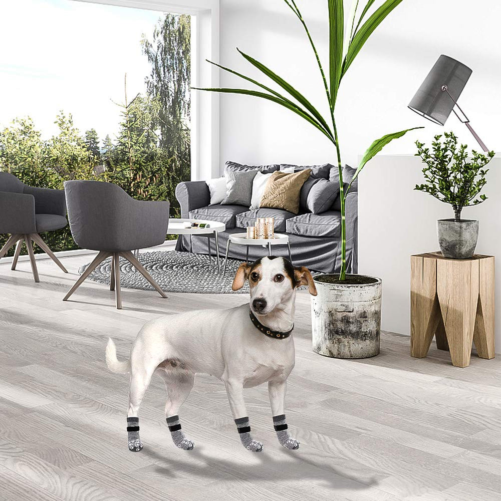 EXPAWLORER durable-bottom dog socks provide grip and washable durability after outdoor use.