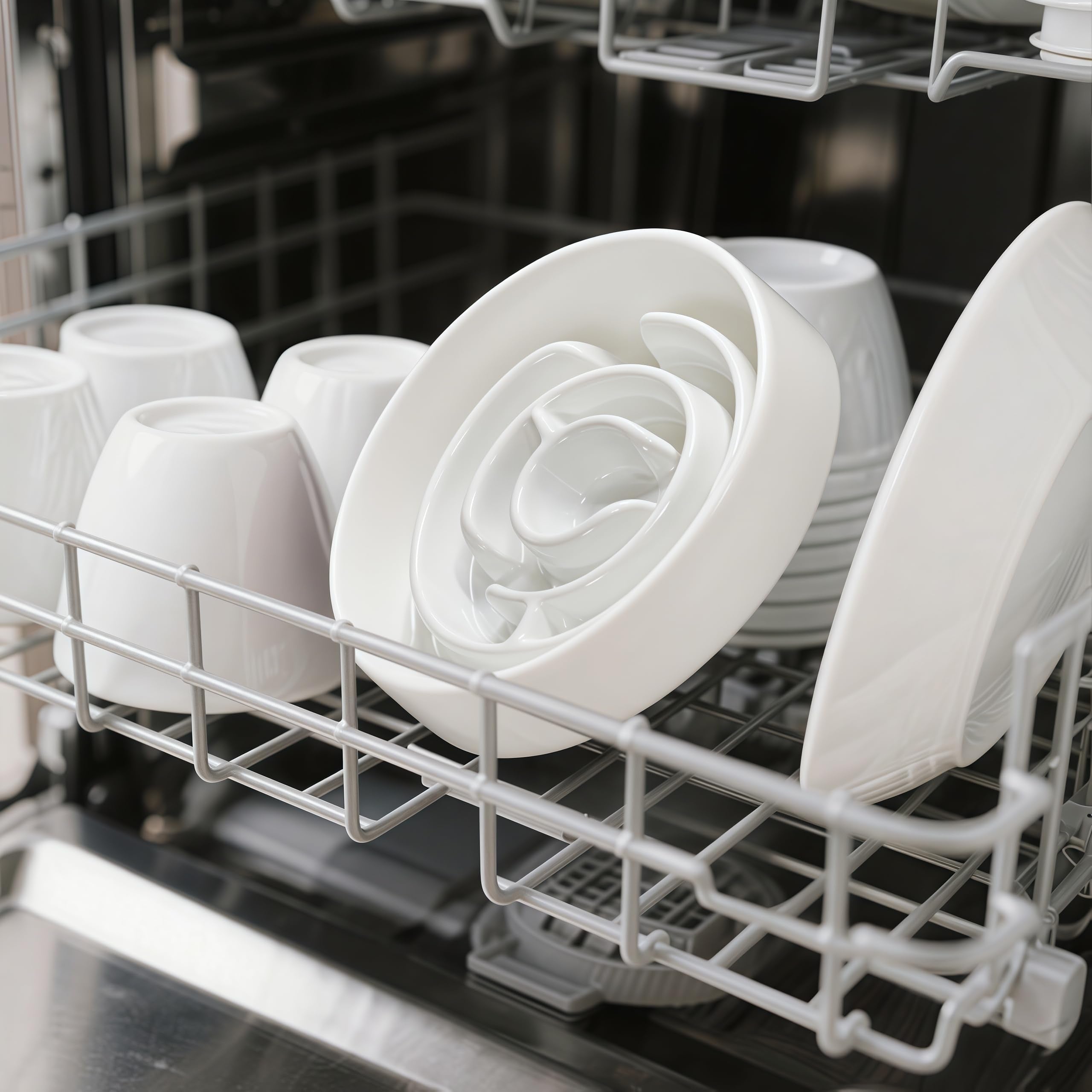 Facdiary ceramic white slow-feeder bowl demonstrated as dishwasher-safe for easy cleanup.