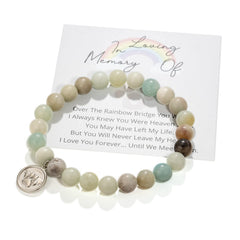 Famdecor Rainbow Bridge bracelet on wrist, offering a comforting memorial moment for grieving pet owners.
