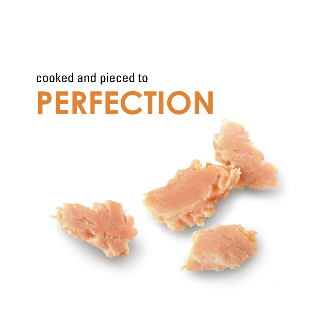 Fancy Feast hand-selected chicken close-up shows pure poultry quality for treats.