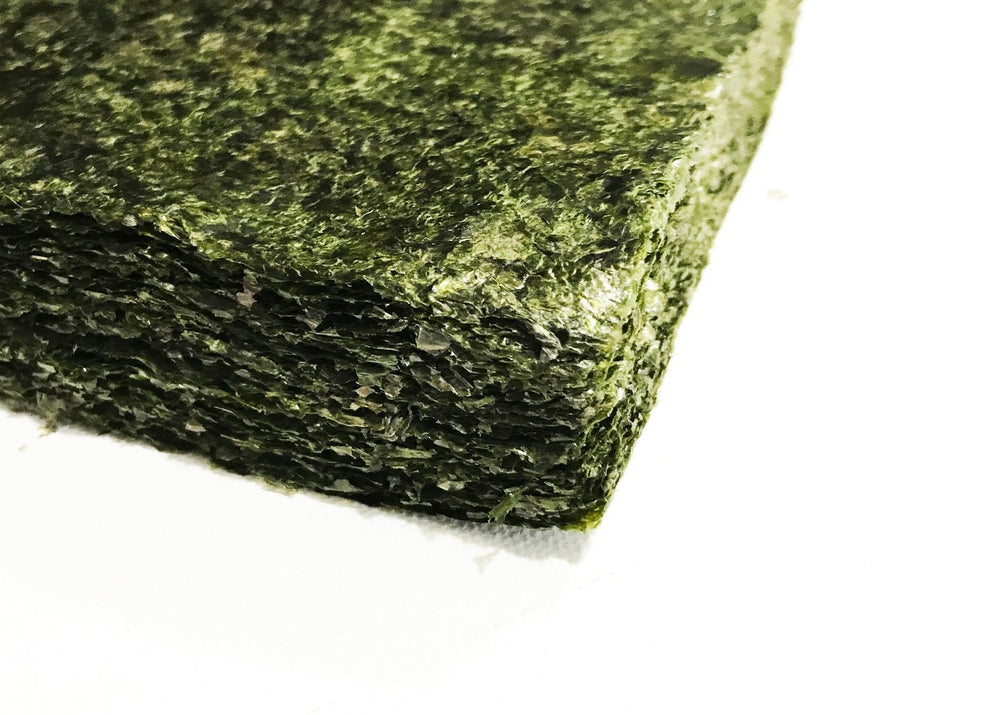 Far Edge Aquatics green seaweed closeup of high-grade dried sheets for steady nutrition.