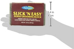 Farnam Slick 'N Easy block on horse coat demonstrates debris removal during grooming.