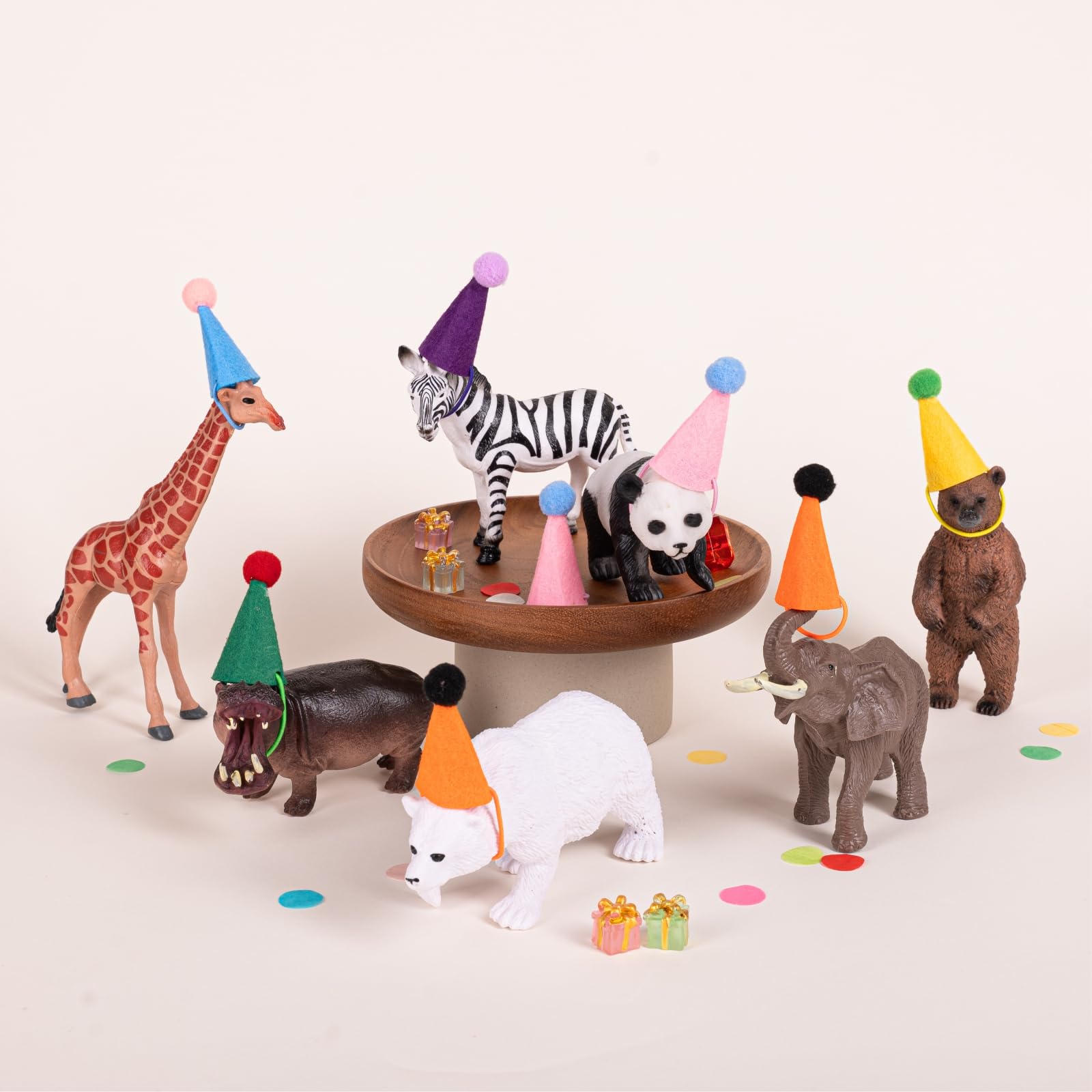 Fiestivo mini party hat for stuffed animals in orange sparks festive photos.