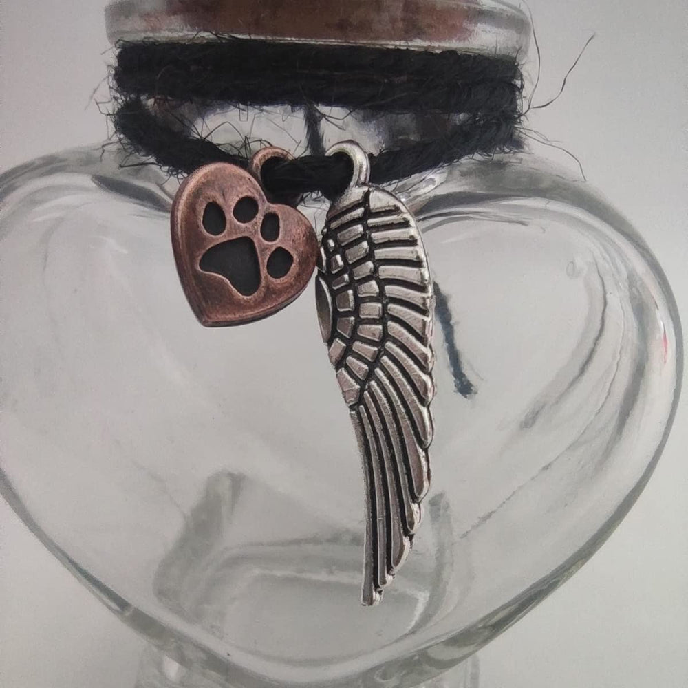 Fight Club memorial bottle cork-top detail highlights dignified pet fur remembrance.