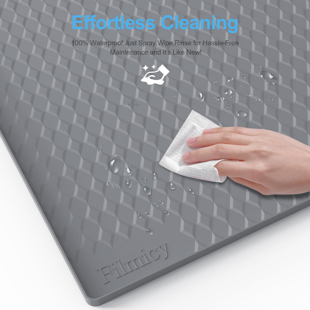 Filmicy pee pad holder features textured support improving airflow and absorption.