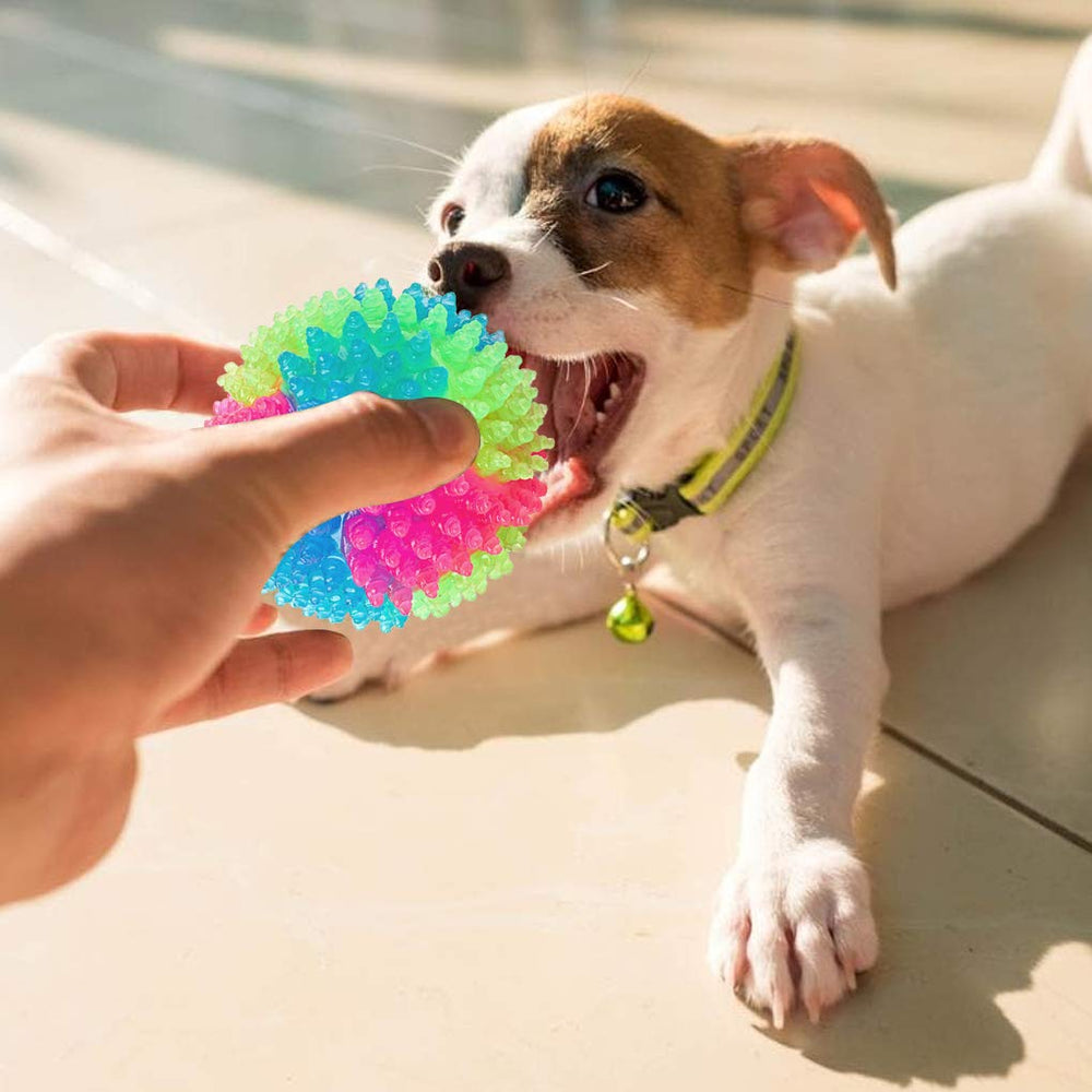 Close-up of FineInno glowing LED ball highlighting interactive play in low light.