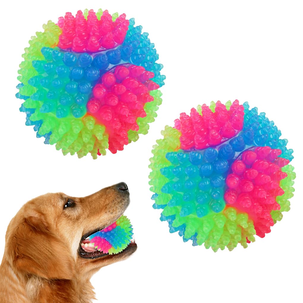 FineInno light-up dog ball in closeup shows durable silicone and bright glow for nighttime fetch.