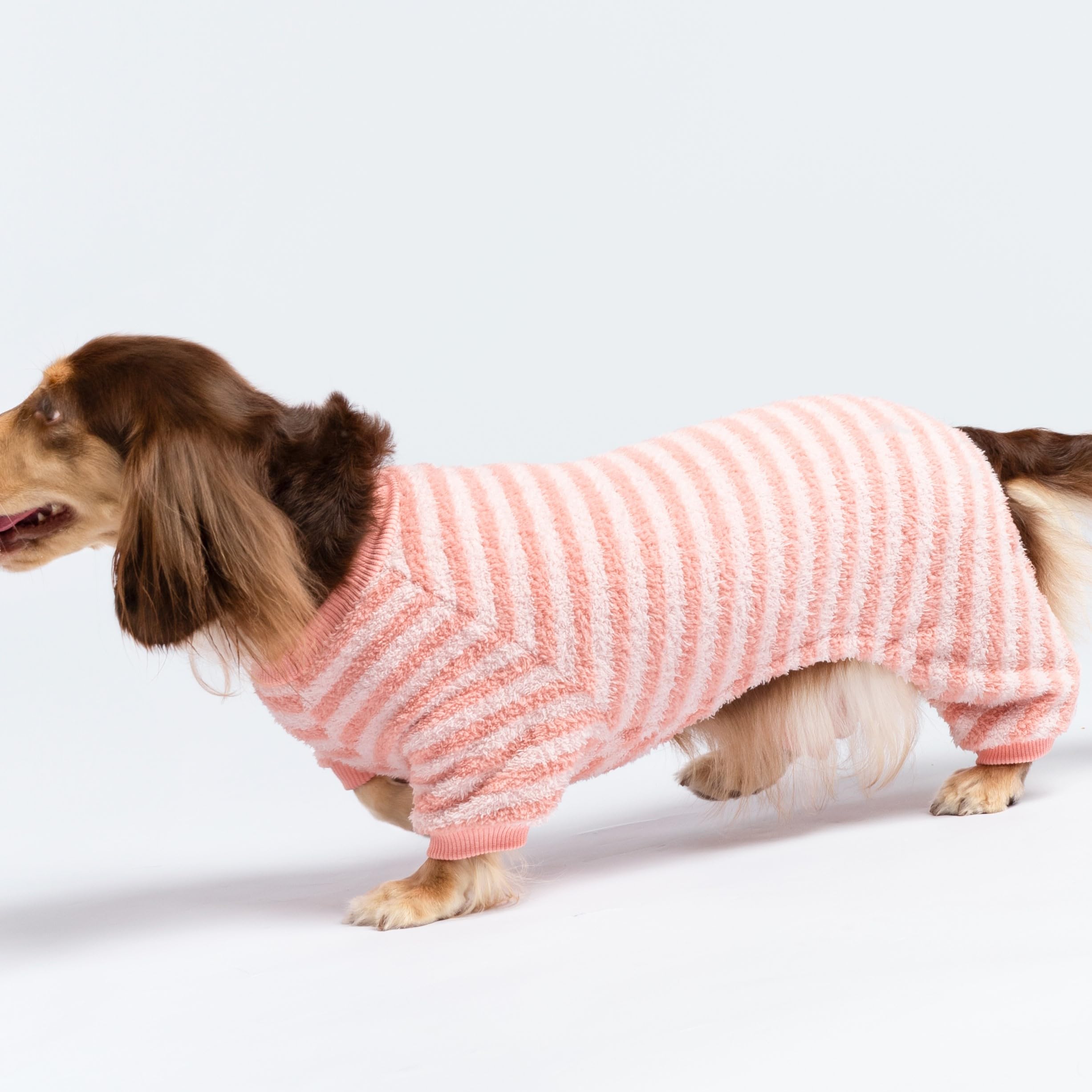 Fitwarm full-body dog jumpsuit provides complete coverage for cozy winter comfort.
