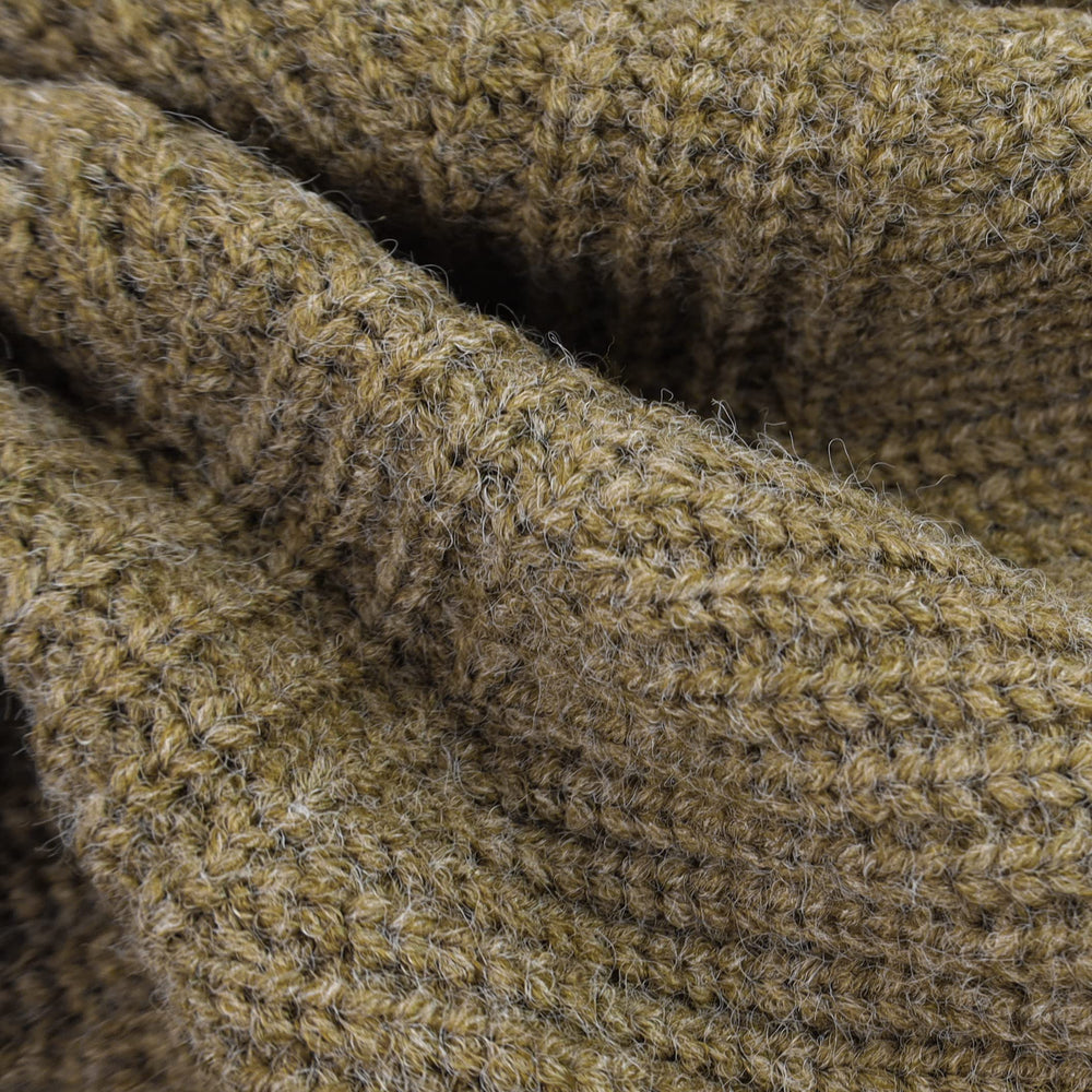 Fitwarm sage-green sweater shown for photos, adding stylish warmth to moments.
