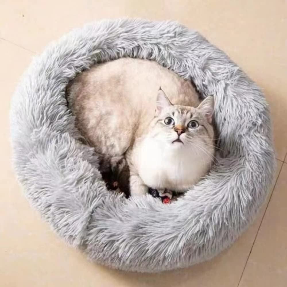 Large Cat Bed fluffy faux fur exterior adds warmth and comfort.