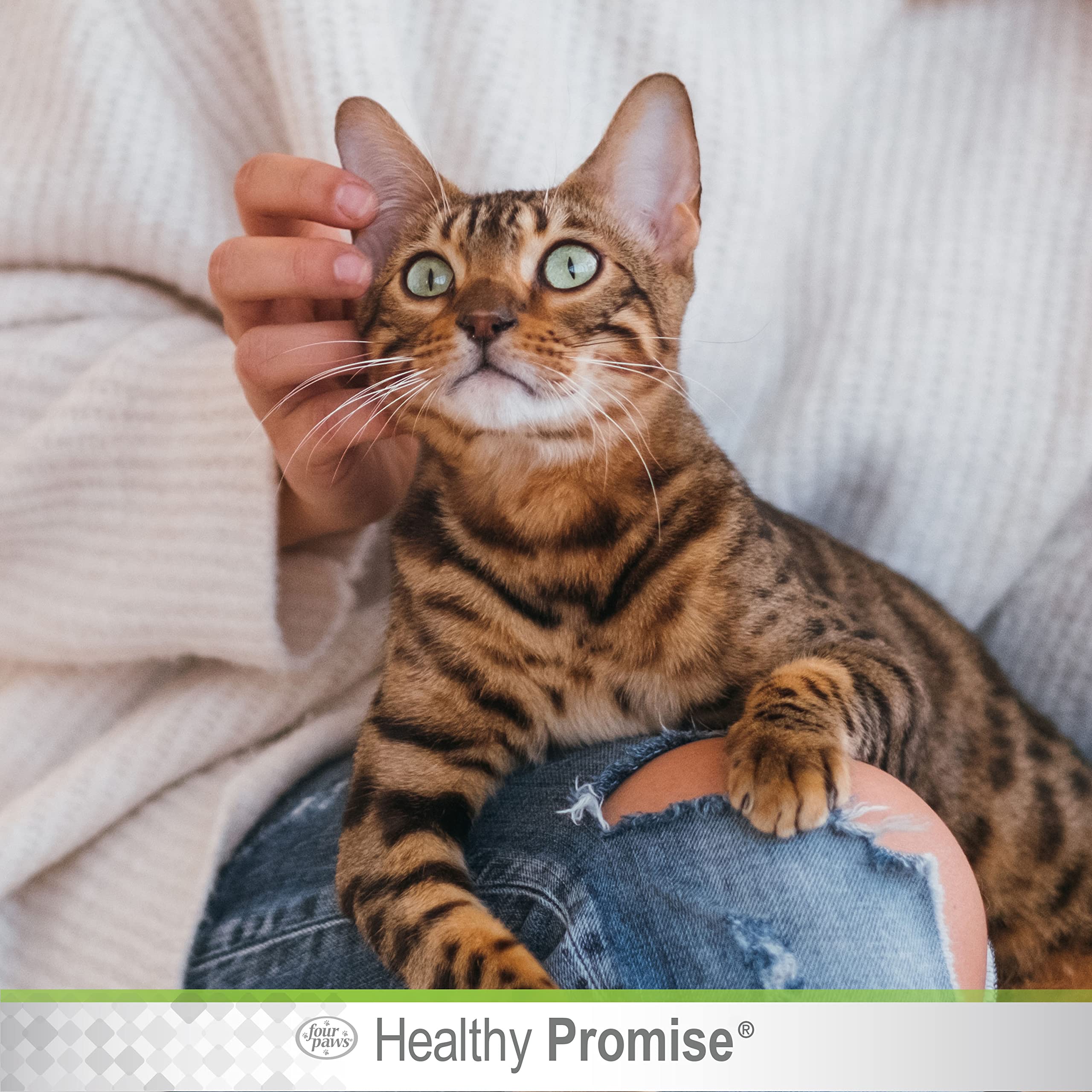 Four Paws Healthy Promise ear mite remedy label shows pyrethrins and piperonyl butoxide