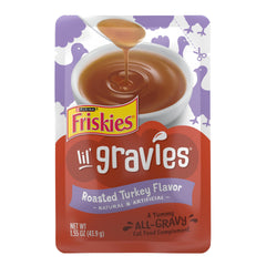 Friskies Lil' Gravies Roasted Turkey Flavor pouch pours gravy to top dry kibble
