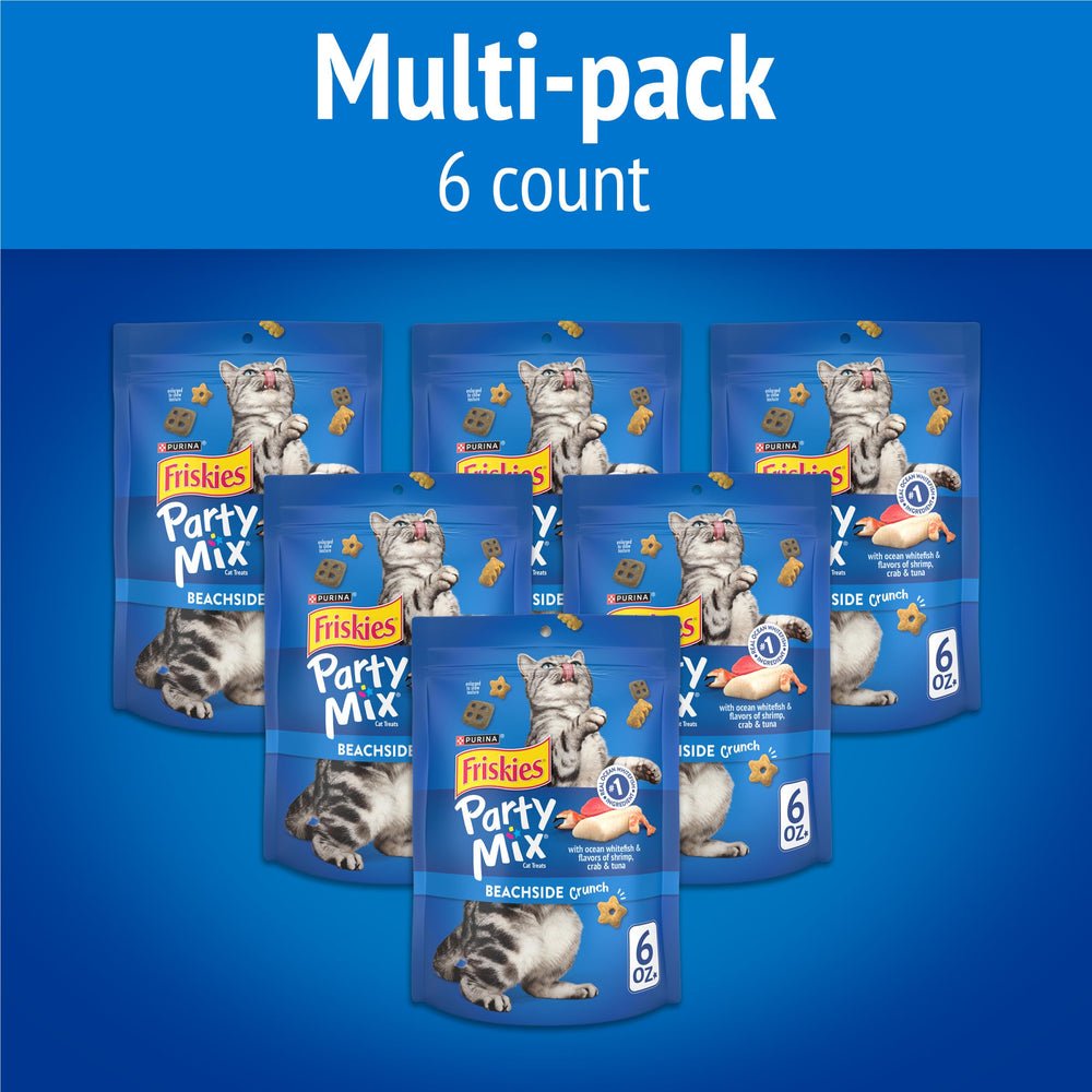 Friskies Beachside Crunch pieces spread for snack moments with cat focus.