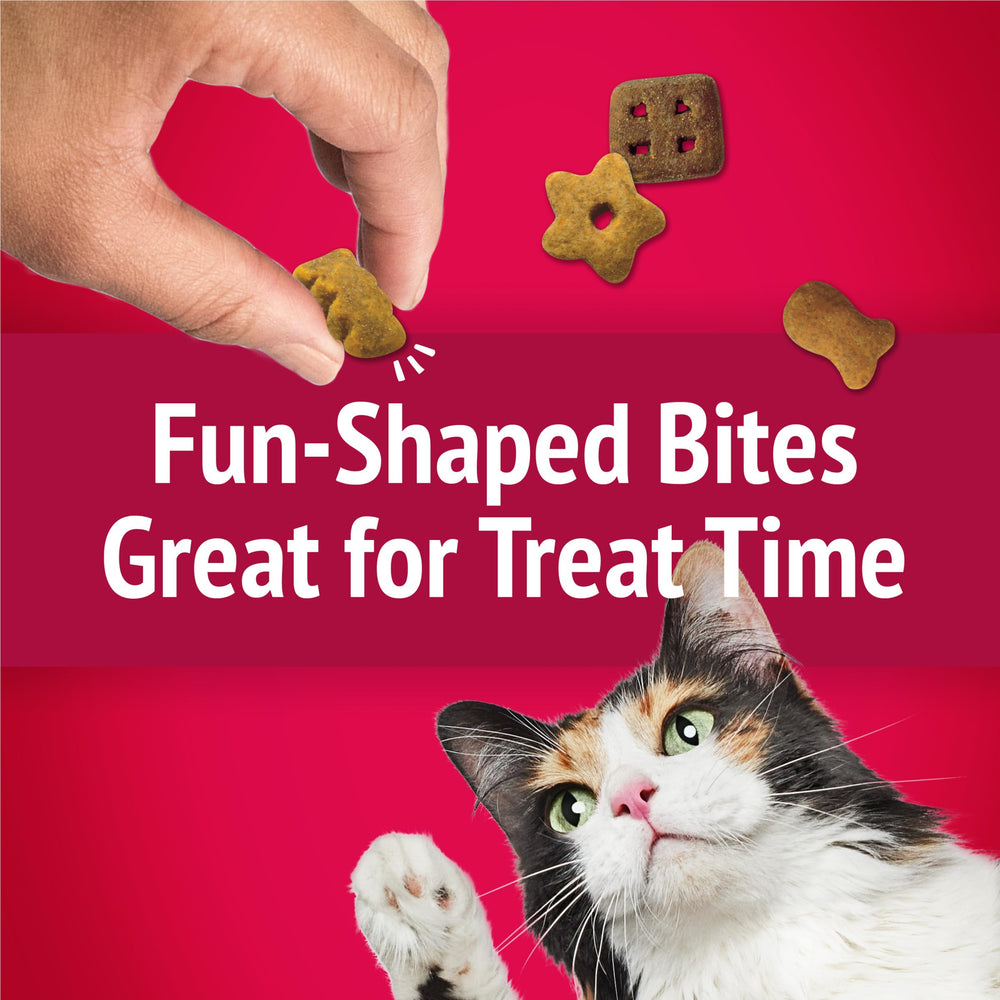 Friskies Serving suggestion with cat enjoying treat during cuddle time.