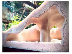 FROSTO corner cave desert tan angle showing space-saving corner fit for tanks.