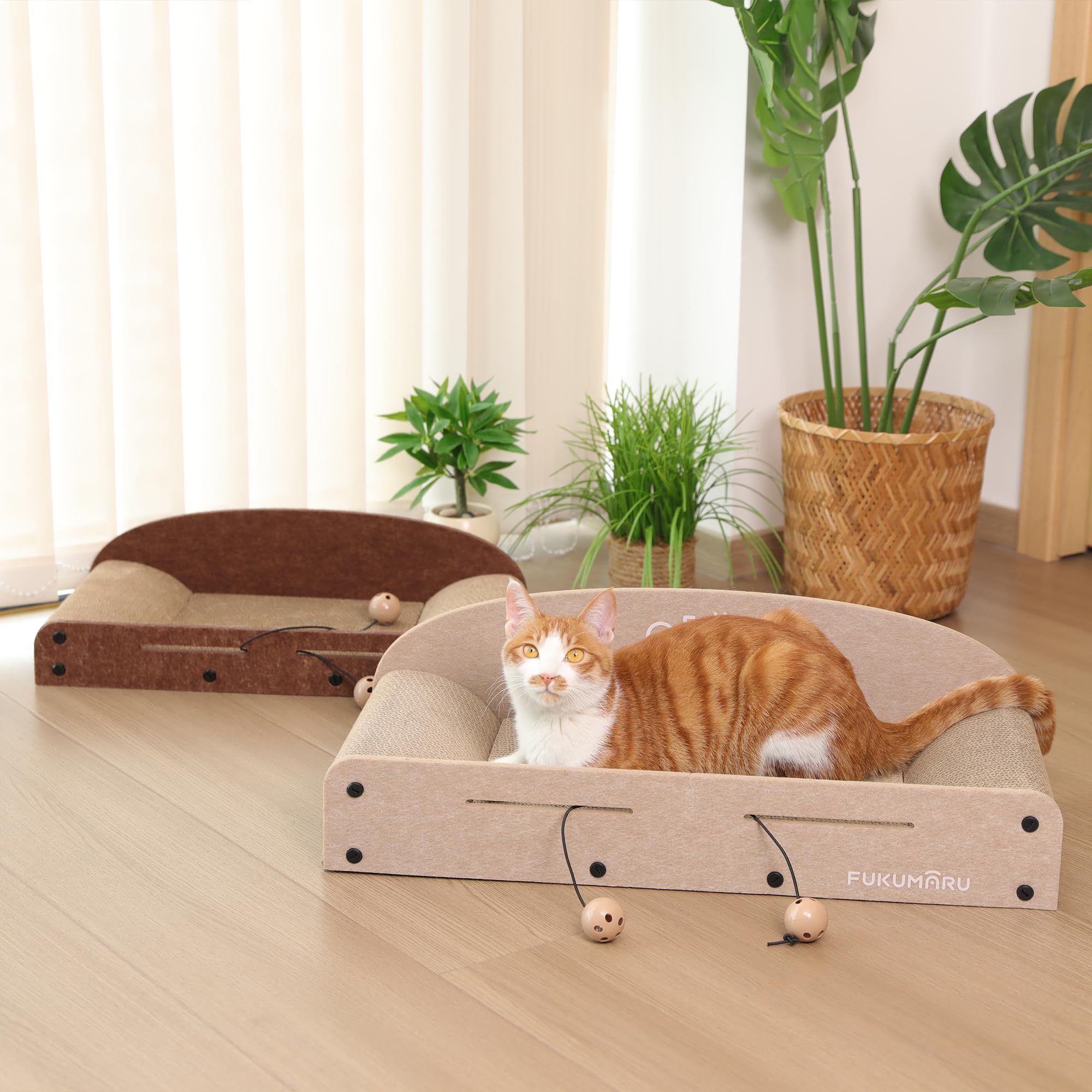 FUKUMARU bell balls on elastic cord provide gentle play while protecting furniture