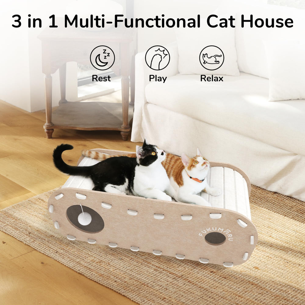 FUKUMARU cat bed lower cave with four holes for hiding and playful peeks.