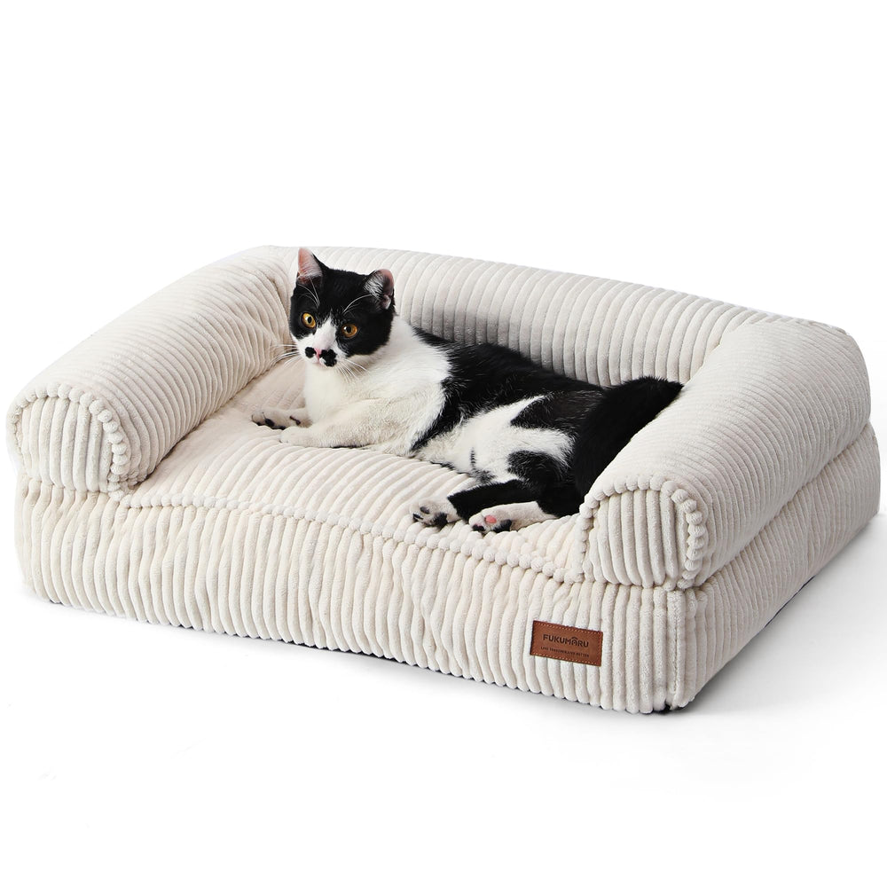 FUKUMARU dog couch bed corduroy cream closeup shows cozy warmth for cold days.