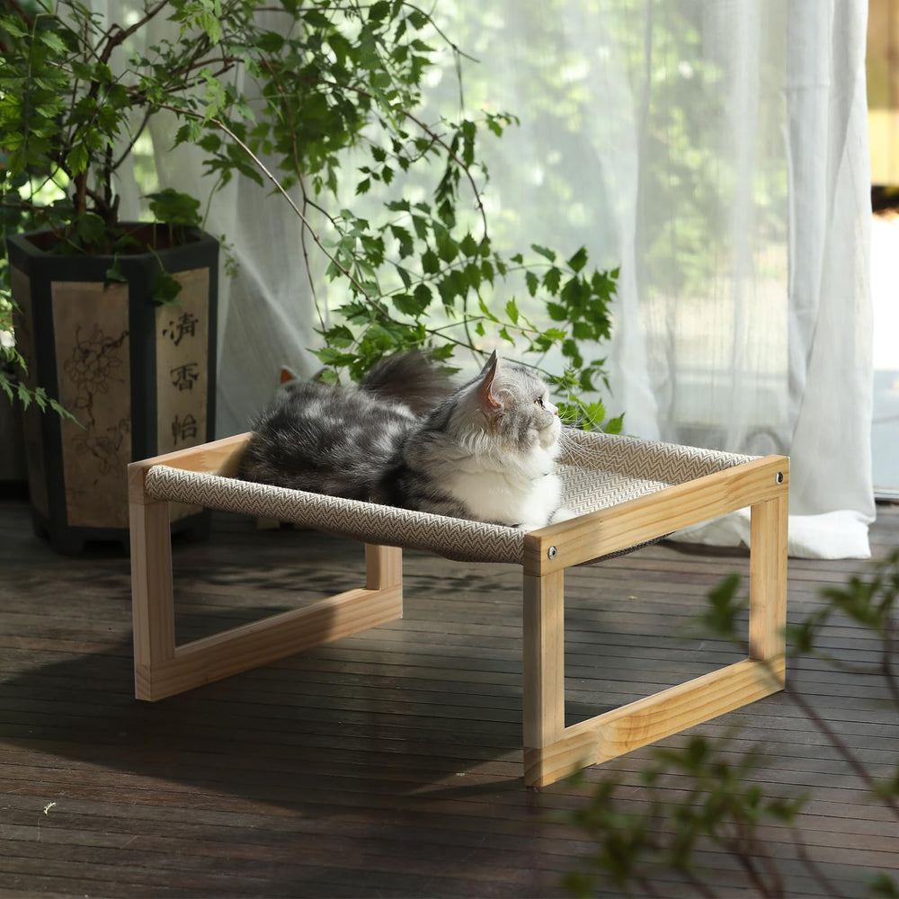 FUKUMARU elevated pet bed perch lets pets survey surroundings.