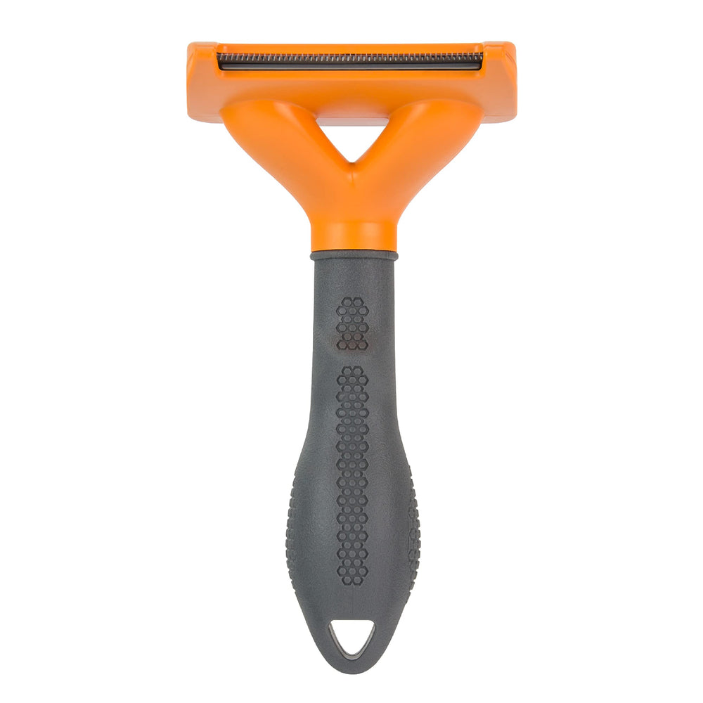 FURminator FURejector button release shown during grooming