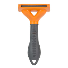 FURminator FURejector button release shown during grooming