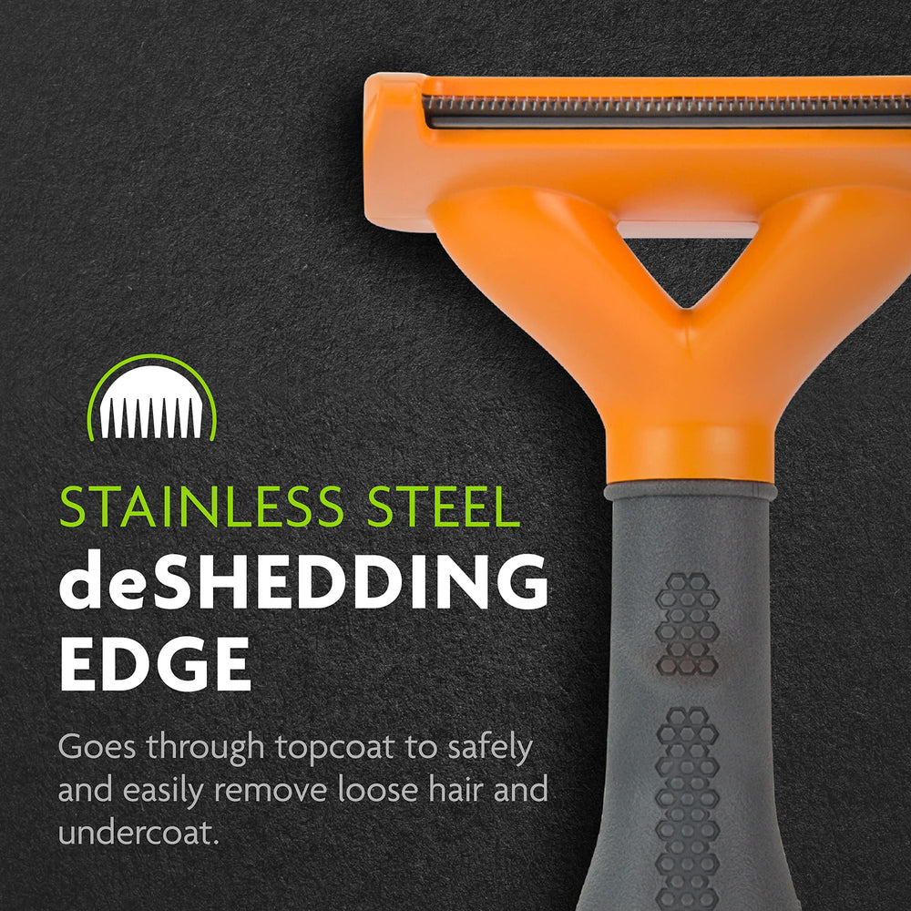 FURminator shedding-reduction tool in action near furniture surfaces.