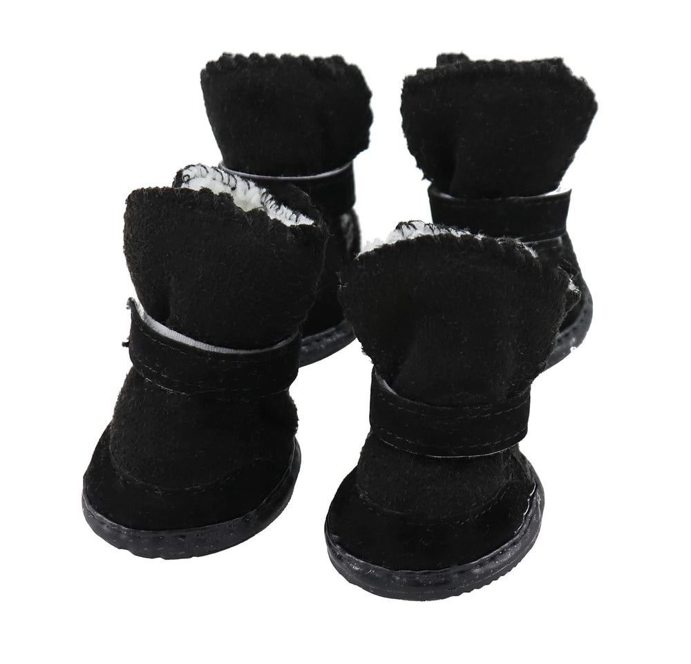 GabeFish Puppy Winter Boots anti-slip sole on icy surface shows grip.