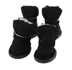 GabeFish Puppy Winter Boots anti-slip sole on icy surface shows grip.