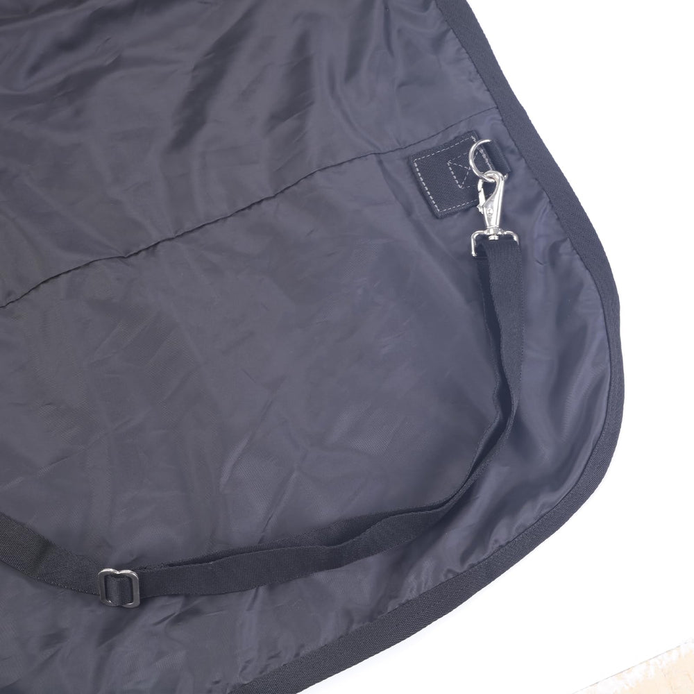 Gallopoff no-fill turnout sheet blocks rain while preventing overheating on damp days.
