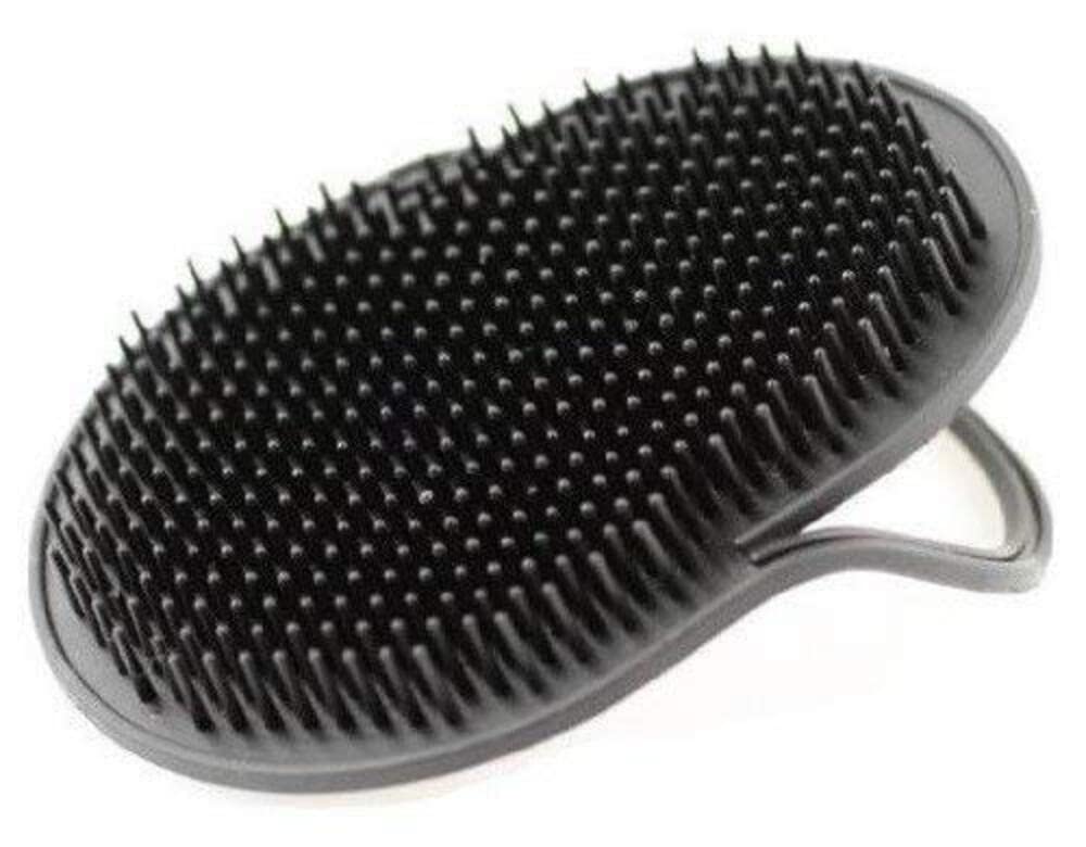G.B.S Pocket Palm Brush closeup highlights ergonomic design for soothing hair massage.