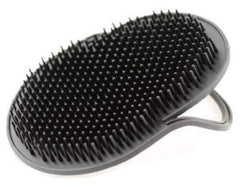 G.B.S Pocket Palm Brush closeup highlights ergonomic design for soothing hair massage.