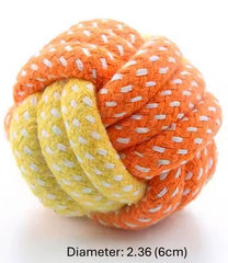 Generic Pet colorful rope knot ball in hand for travel-friendly play.