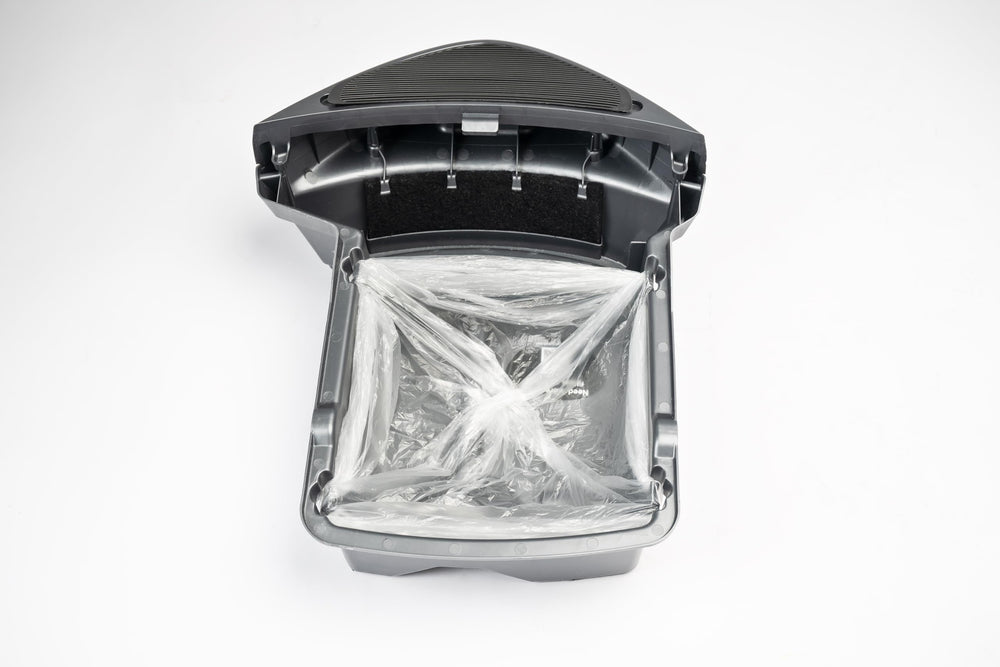 Generic waste-drawer-liner-bags show clean disposal and reduced spills.