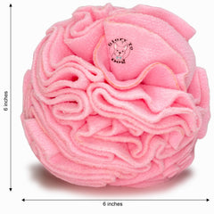 Glory To Dog dog enjoying treats snuffleball pink demonstrates enrichment through scent-led play