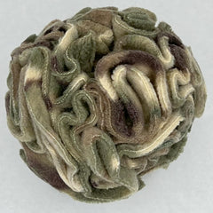 Glory To Dog camouflage snuffle ball being tossed emphasizes sensory enrichment during playtime.