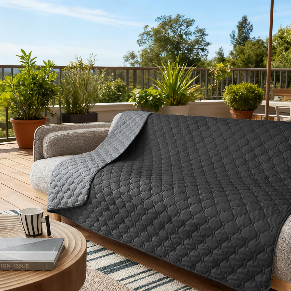 Gogobunny dog blanket shows reversible colors for flexible styling
