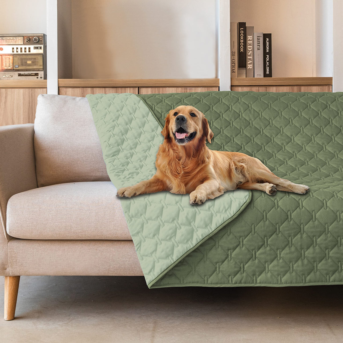 Gogobunny double-sided waterproof blanket on a couch protecting furniture from spills.