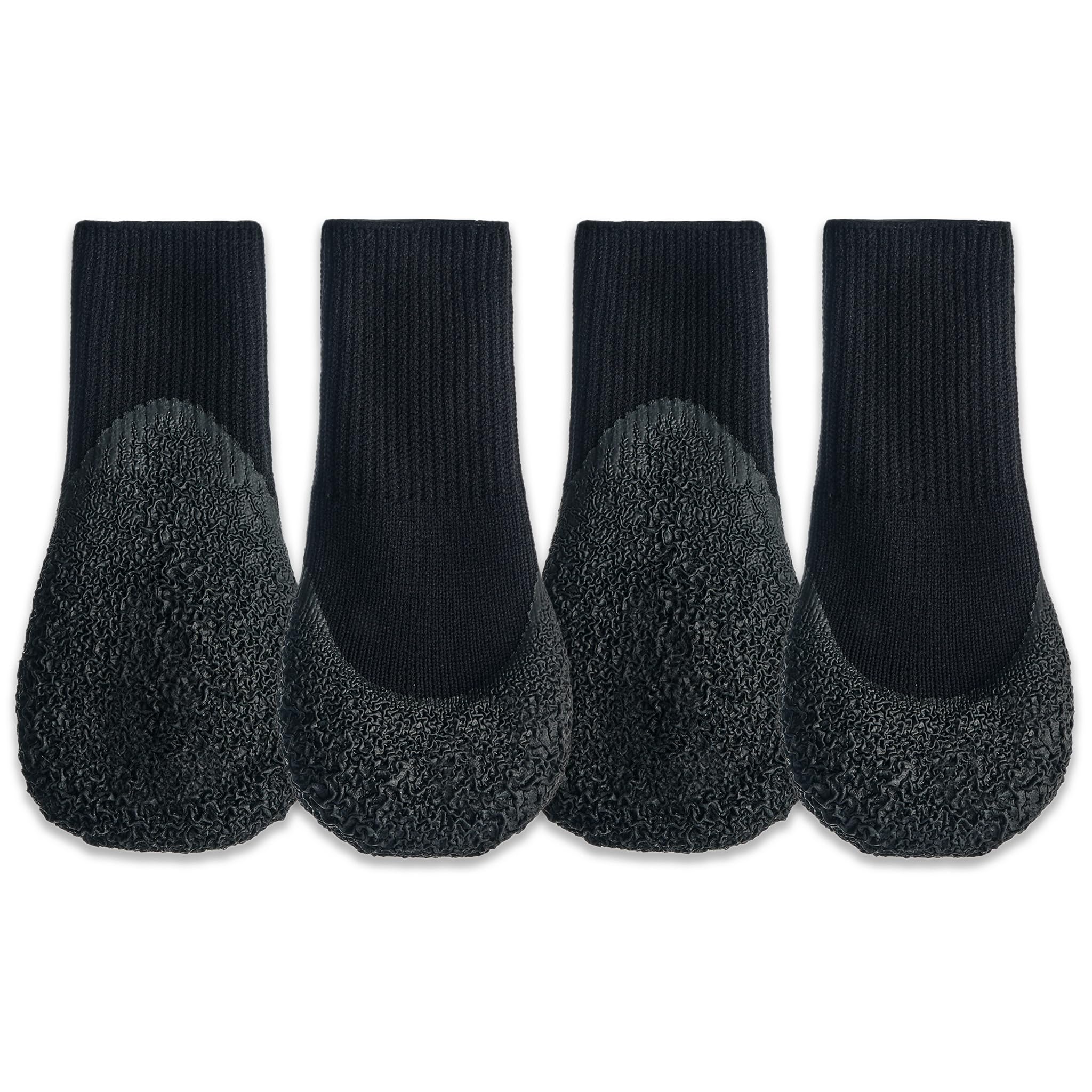 Goo-eez Lites Black L dog boot on paw showing snug compression and protection for paws.