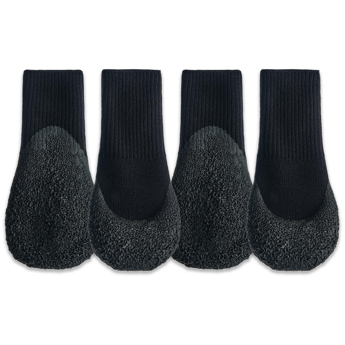 Goo-eez Lites Black L dog boot on paw showing snug compression and protection for paws.