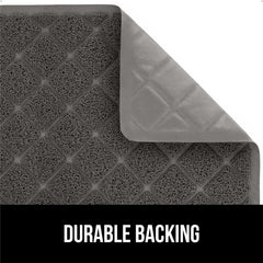 Gorilla Grip mat textured backing stays in place during quick cat exits.