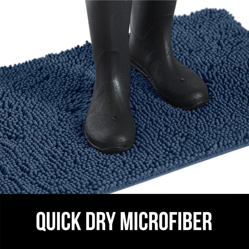 GORILLA GRIP SOAKSTOPPER navy blue rug at entryway enhances cleanliness.