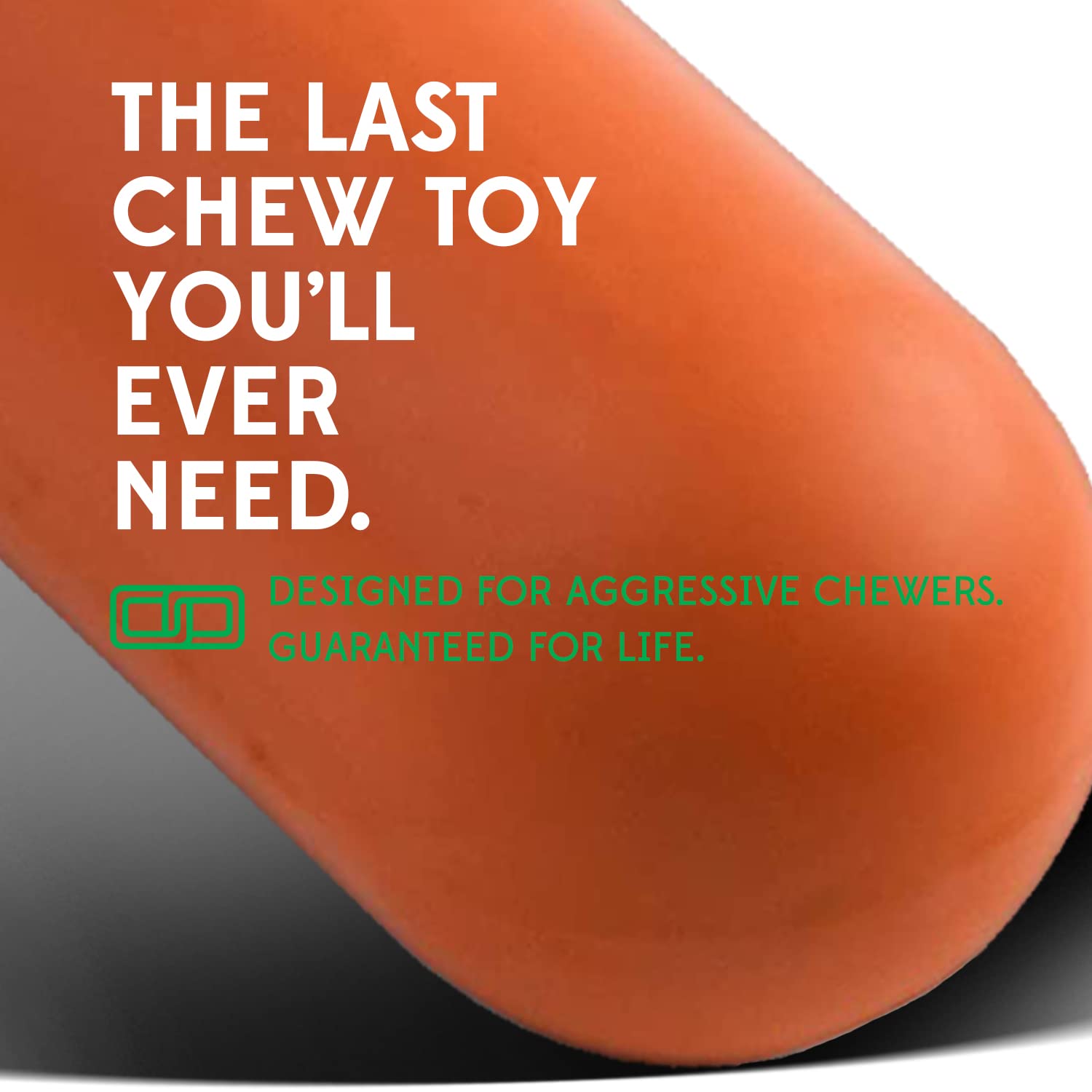 Goughnuts heavy-duty dog toy orange close-up rubber shows durable material for tough chewers.