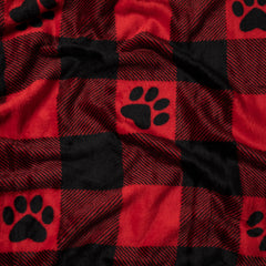 GreaterGood buffalo paws blanket in crate illustrates a secure, comfy nap spot.