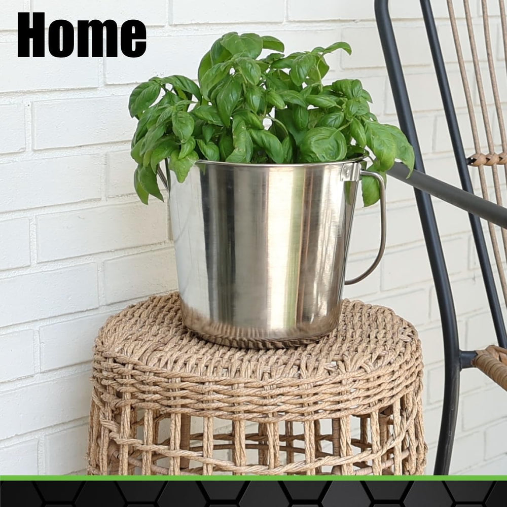 GRIP stainless-steel bucket hanging-on-kennel-fence shows mounting option.