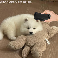 Groompro deshedding brush hair removal closeup demonstrates efficient loose hair management.