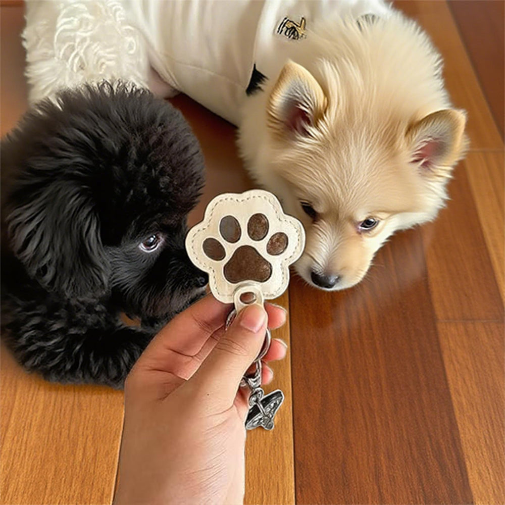 GROTOLY compact paw memorial keychain shown attached to bag for everyday carry.