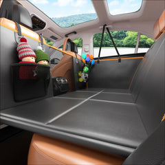 Gusil Back Seat Extender with hard bottom provides stable space for dogs on car trips.